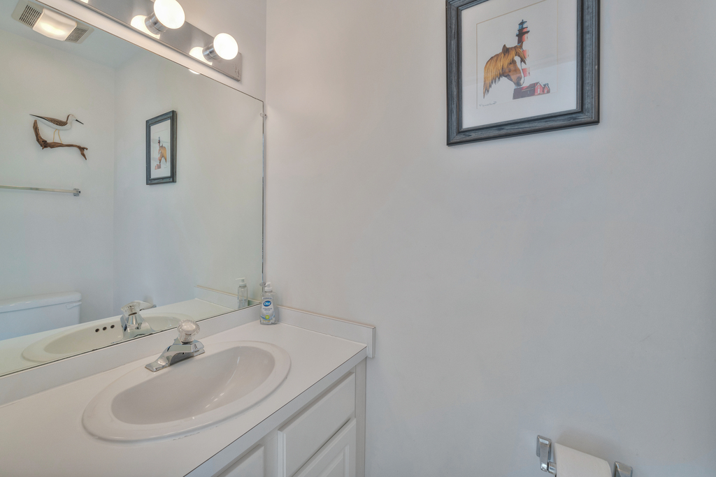 Half Bath conveniently located off Living Area and Kitchen.