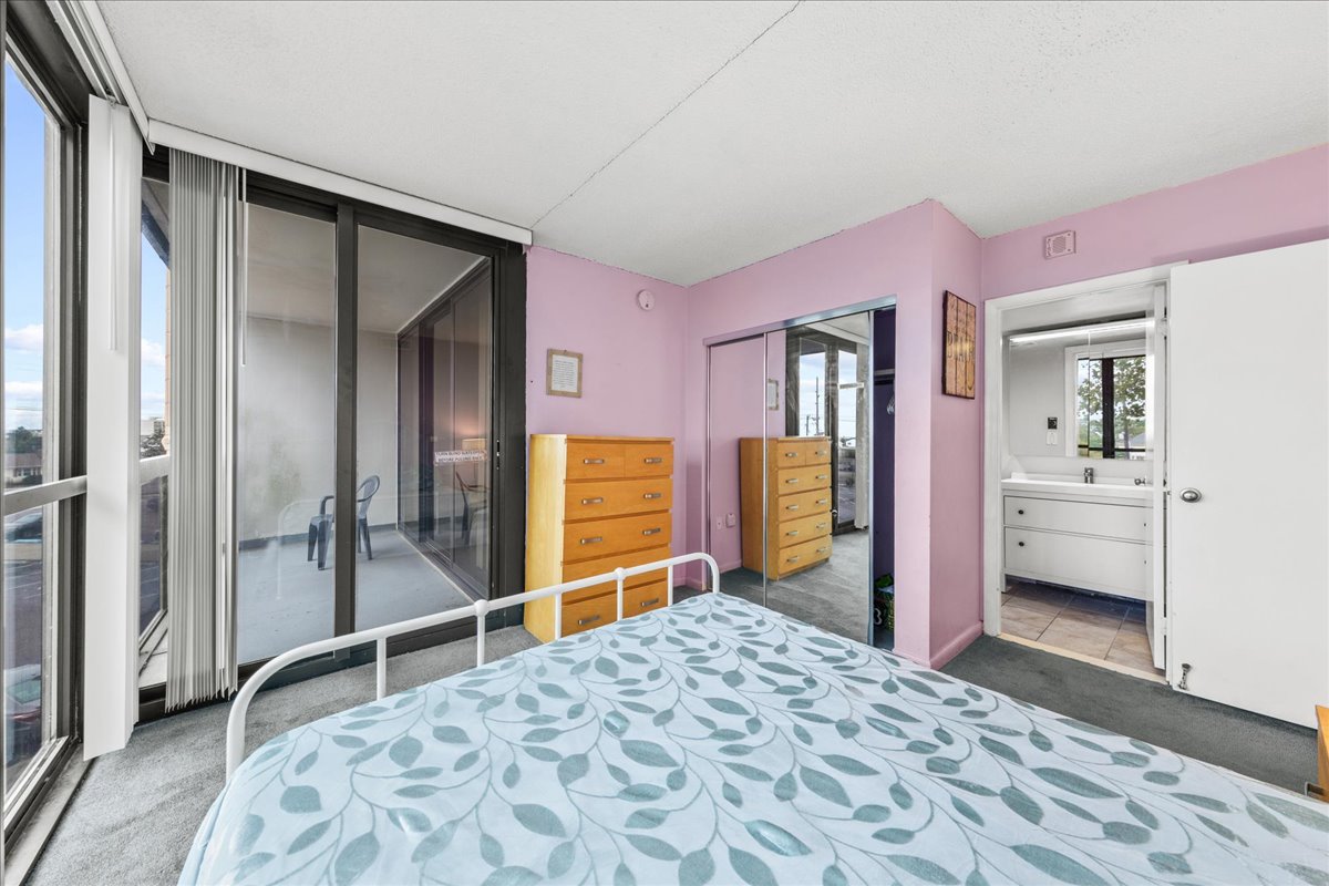 This Bedroom also has a Private Bath & Balcony Access!