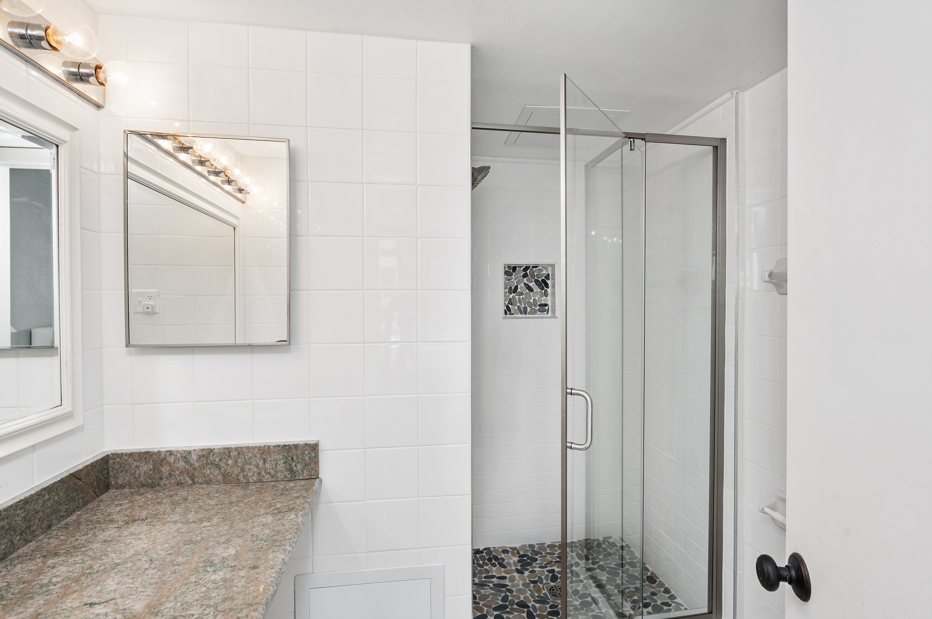 Freshen up in the Updated Walk-In Shower.