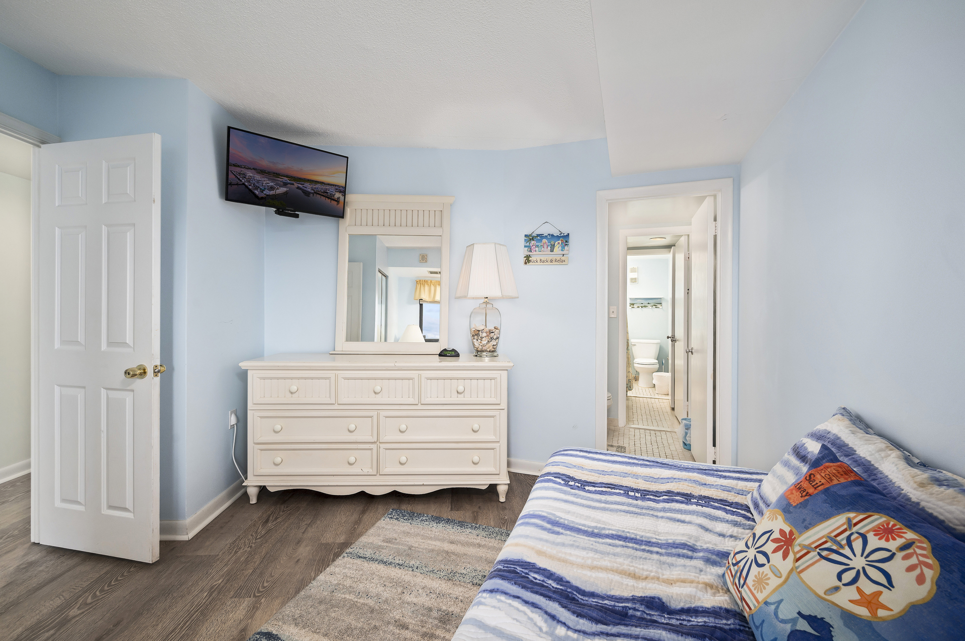 Sink into bed and enjoy the Flat Screen TV.