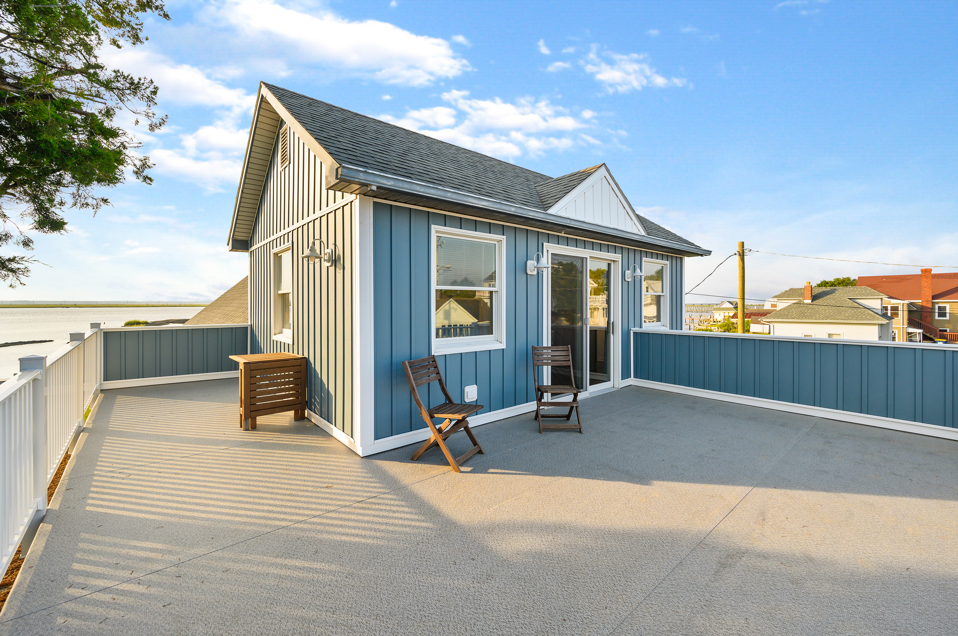 Access to Private Water View Deck on Street side, just off the Master.