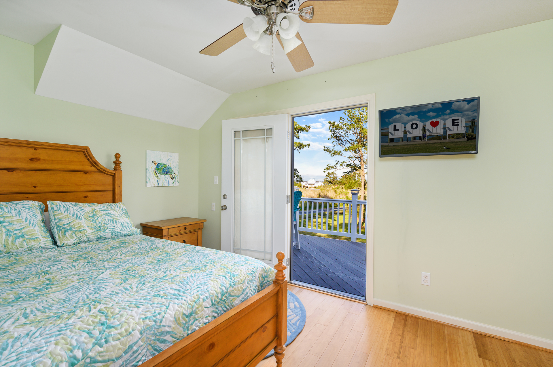 Bedroom 2 has Private Access to a phenomenal Water View Deck.