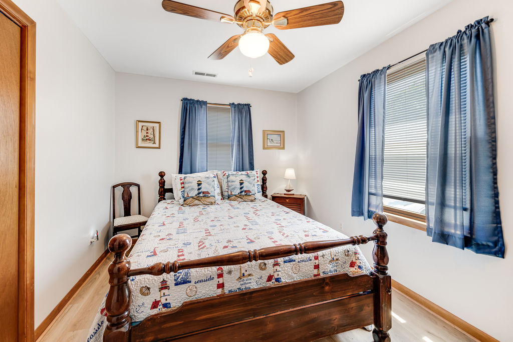 Bedroom 2 has a comfy Queen Bed and Lighthouse Theme.