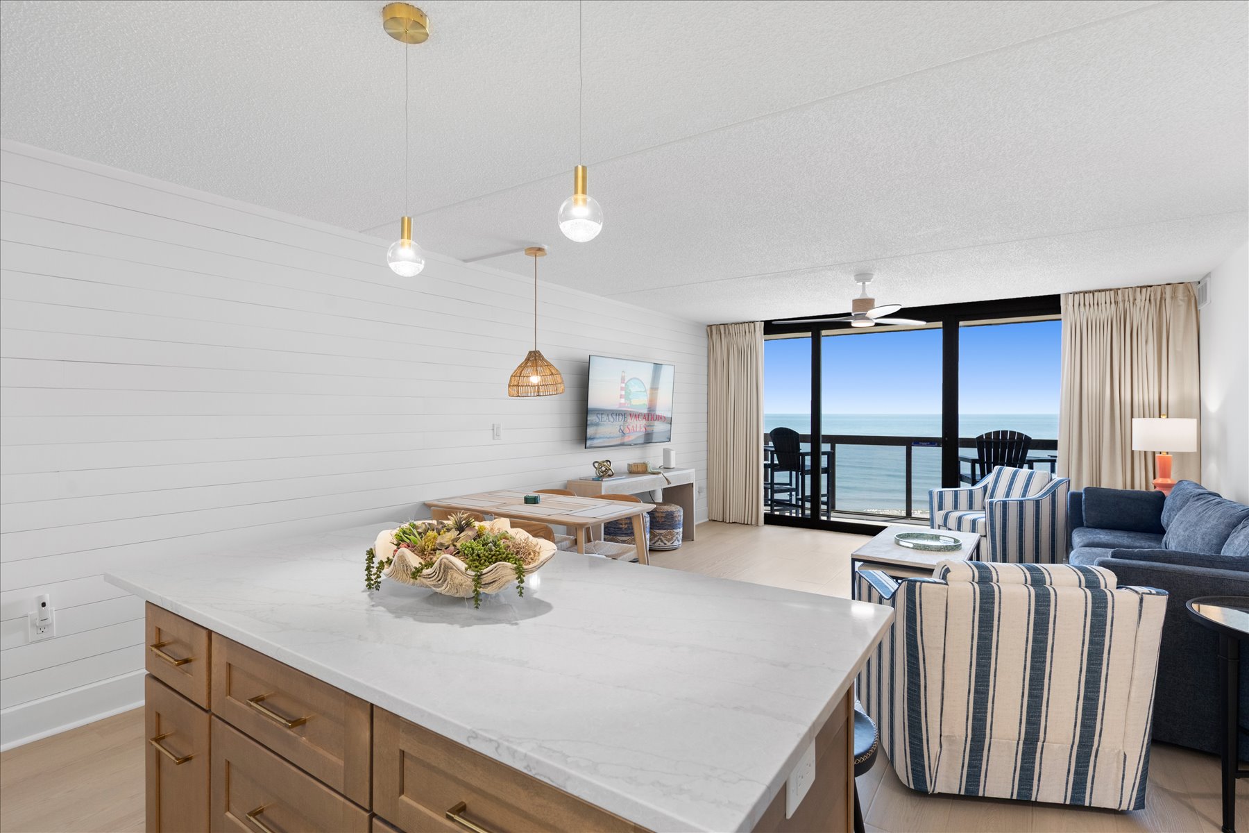 Kitchen flows effortlessly into the living and dining area.