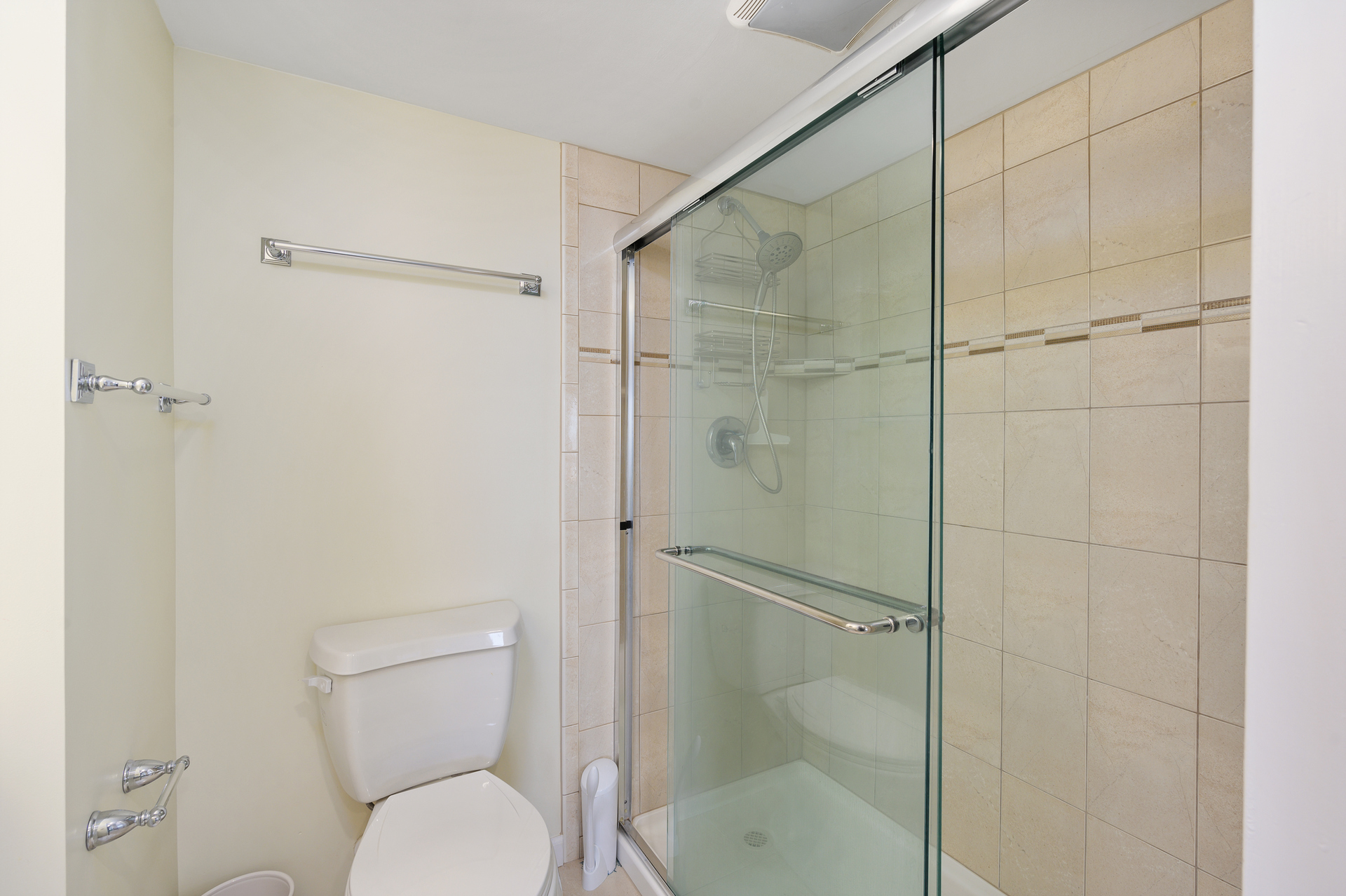 The Primary Bath has a custom-tile, walk in shower