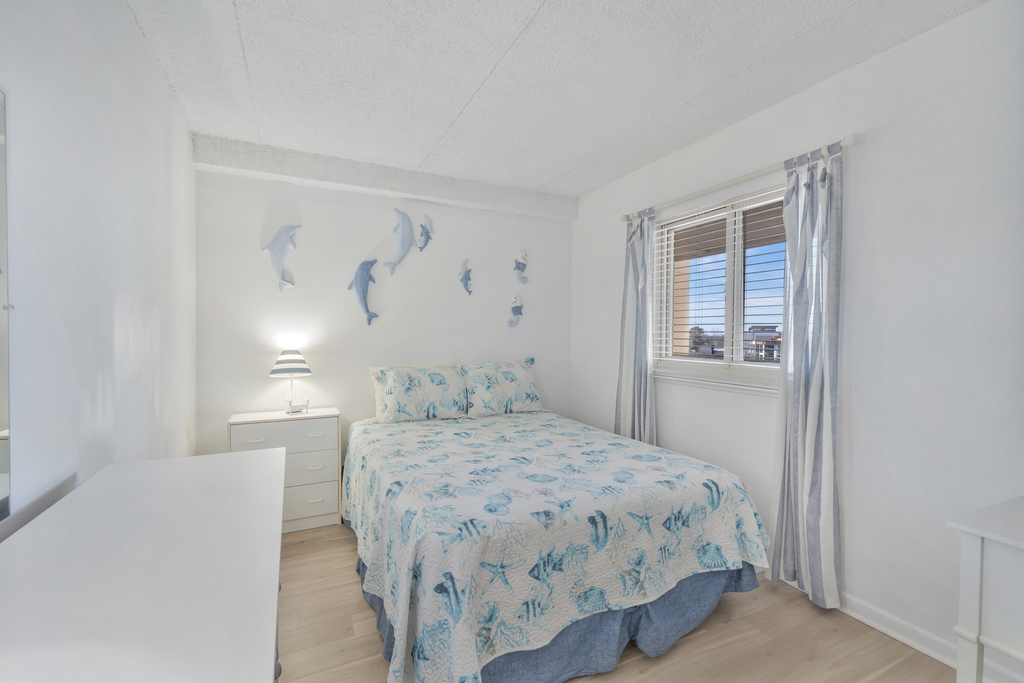 Bedroom 2 has a Plush Queen Bed.