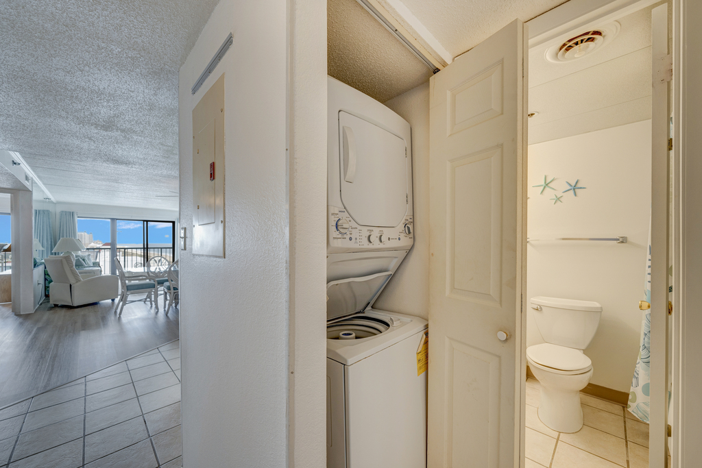 Stacked washer/dryer combo in condo for your convenience!