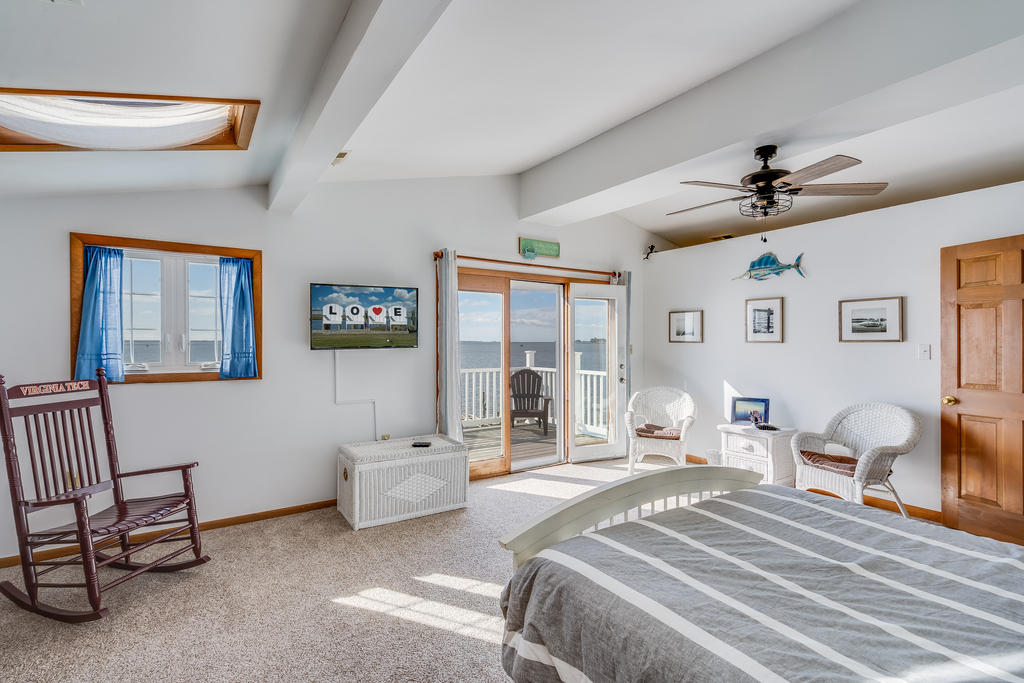 Bedroom 2 has a Flat Screen TV and Breathtaking Views from the Private Balcony.