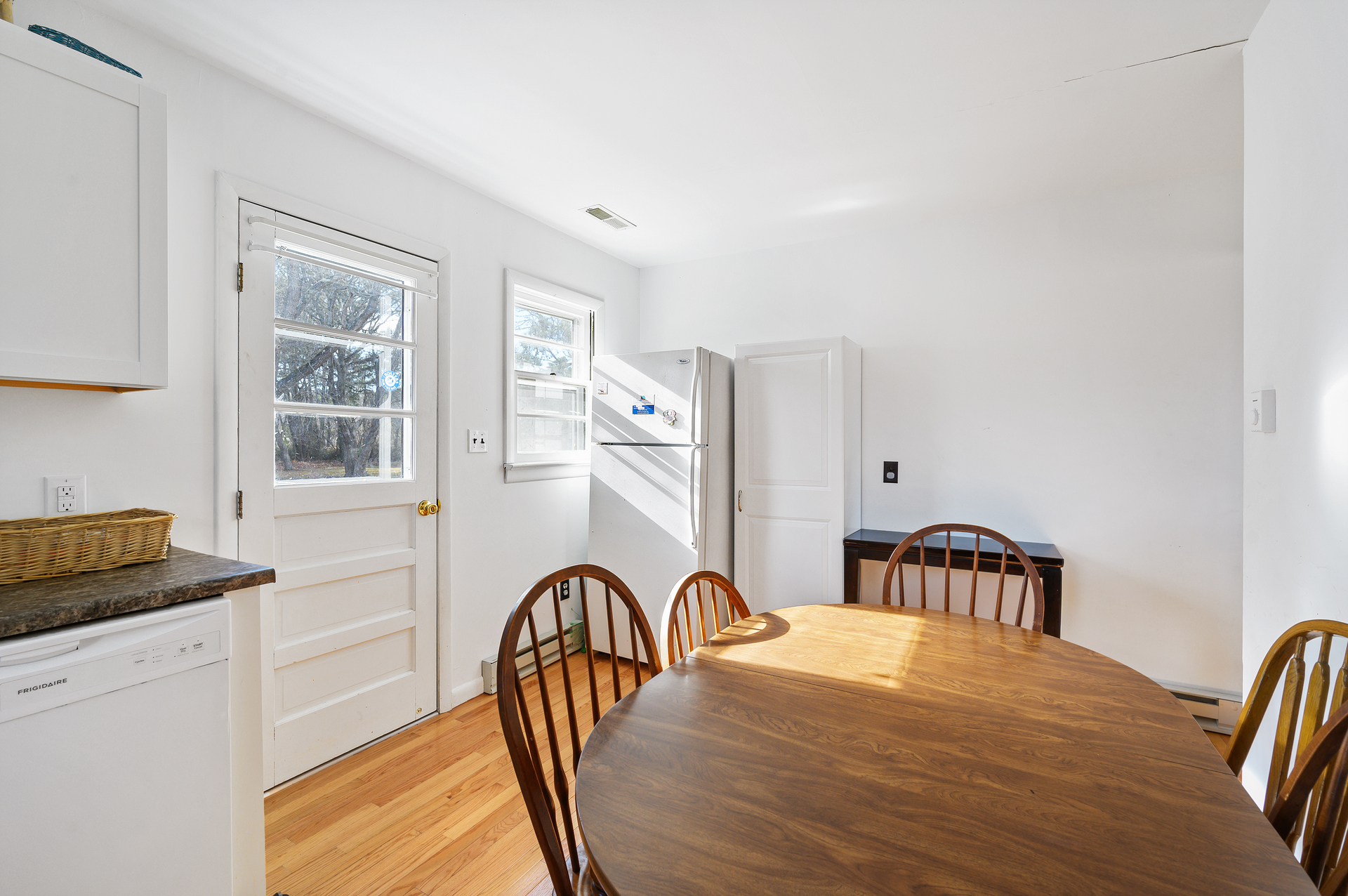 The sunny Eat-in Kitchen has all the comforts of home.