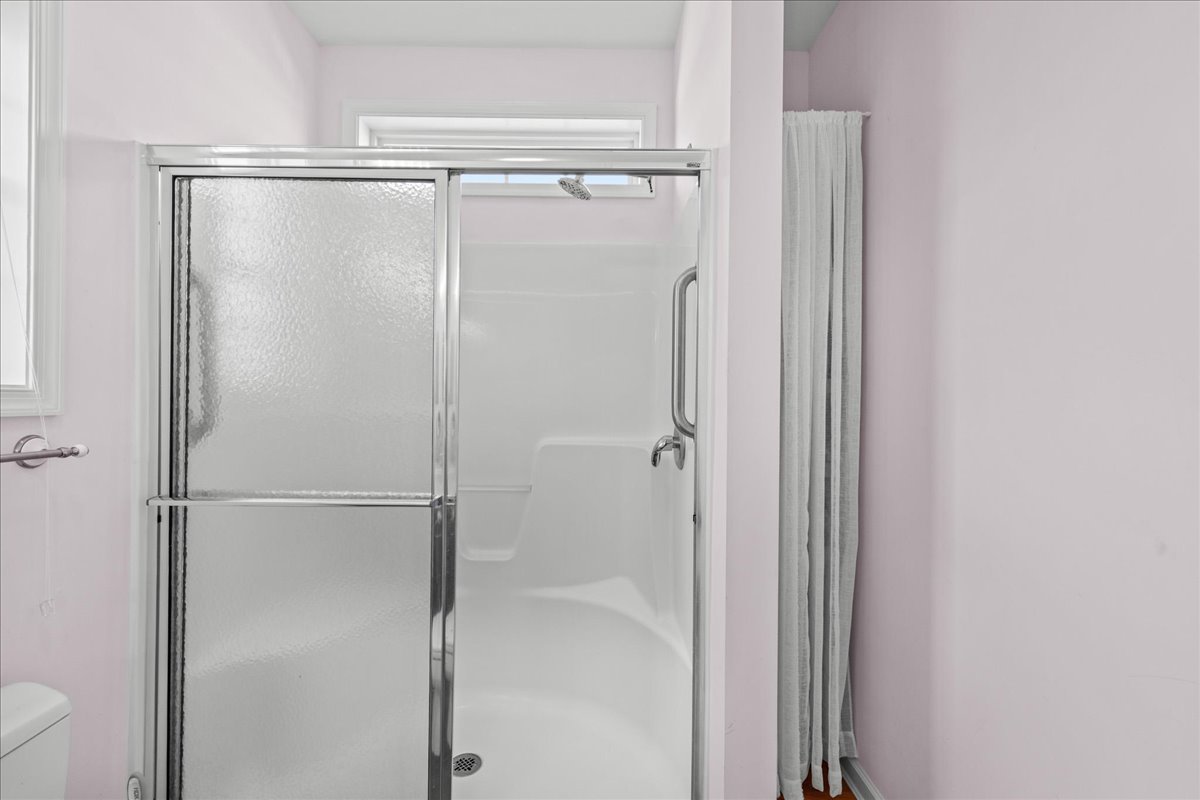 Rinse off the Hot Summer Sun in the Walk-In Shower.