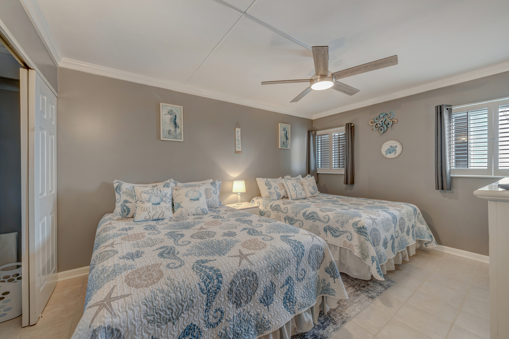 The Bedroom features 2 cozy Queen Beds!