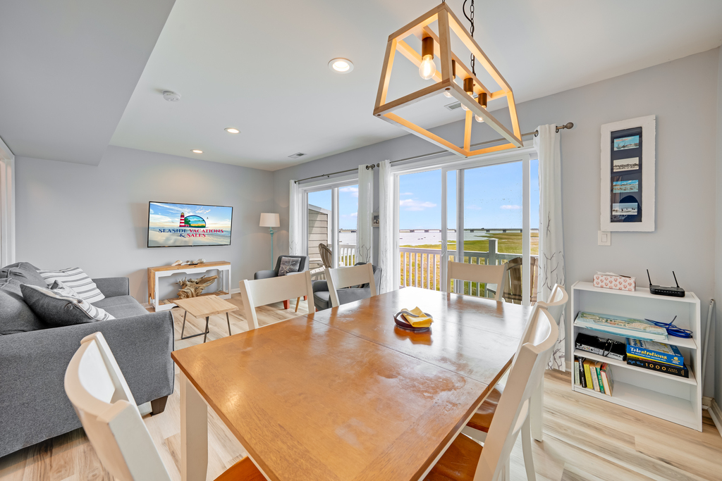 Enjoy family meals at the spacious Dining Area in the comfort of AC, or down on the Dock!