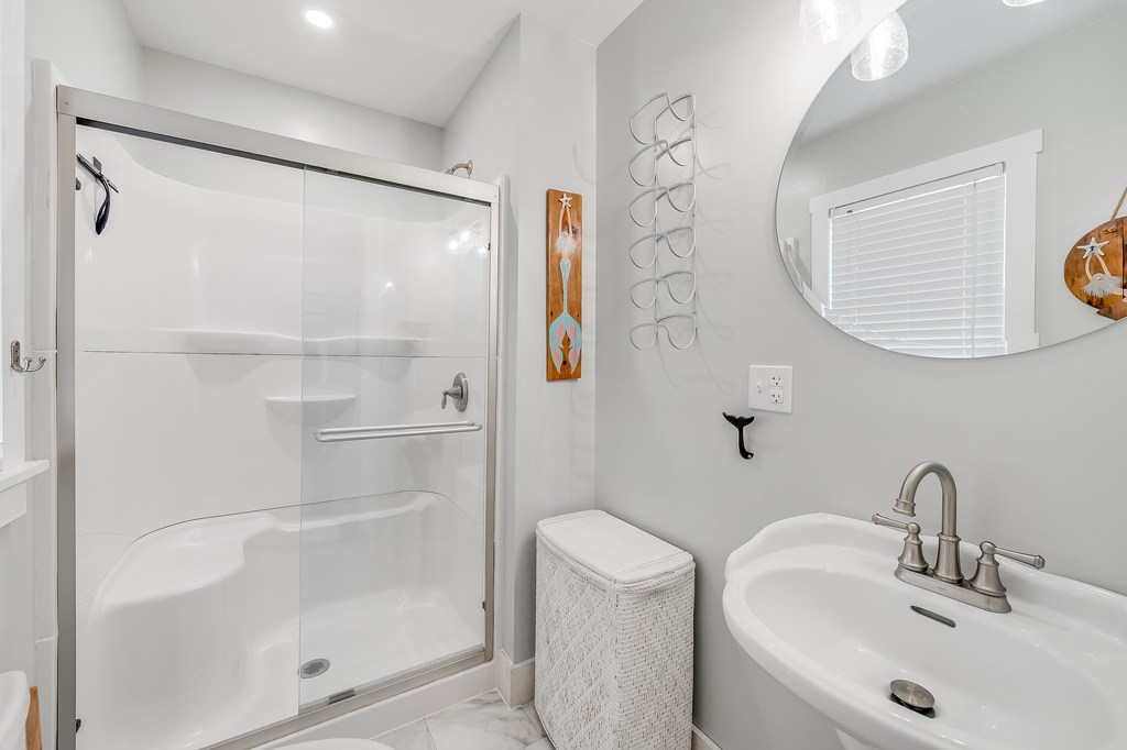 A 2nd Full Bath is shared and convenient to Bedrooms and Living Area.