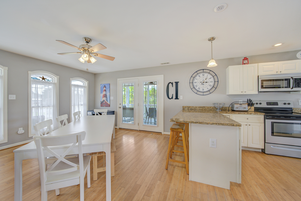 Stunning Hardwood Floors, and tasteful Coastal Decor that's both warm and welcoming.