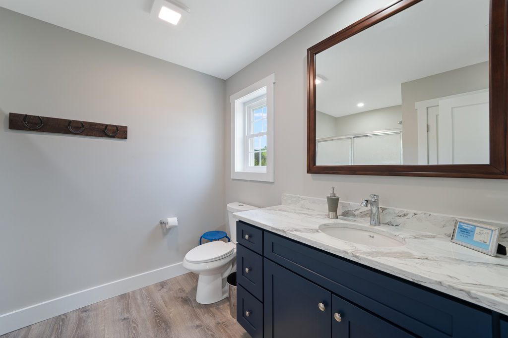 Full Bath 2 is dressed in nautical navy.