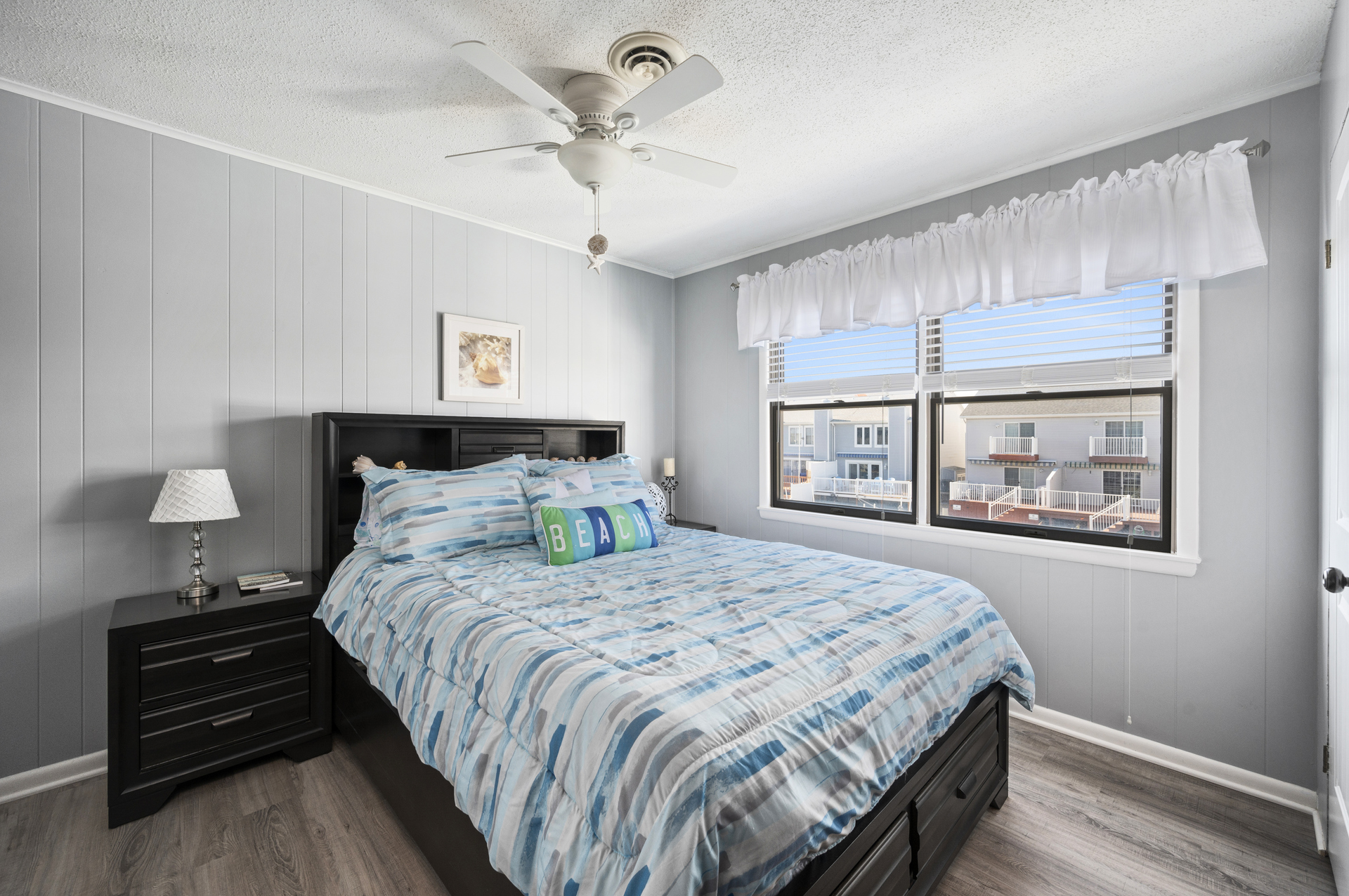 Primary Bedroom has a comfy Queen Bed and amazing Bay Views.