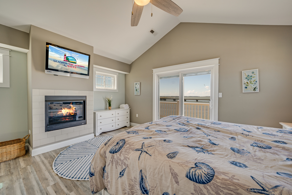 Master Bedroom has Fireplace and Flat Screen TV.