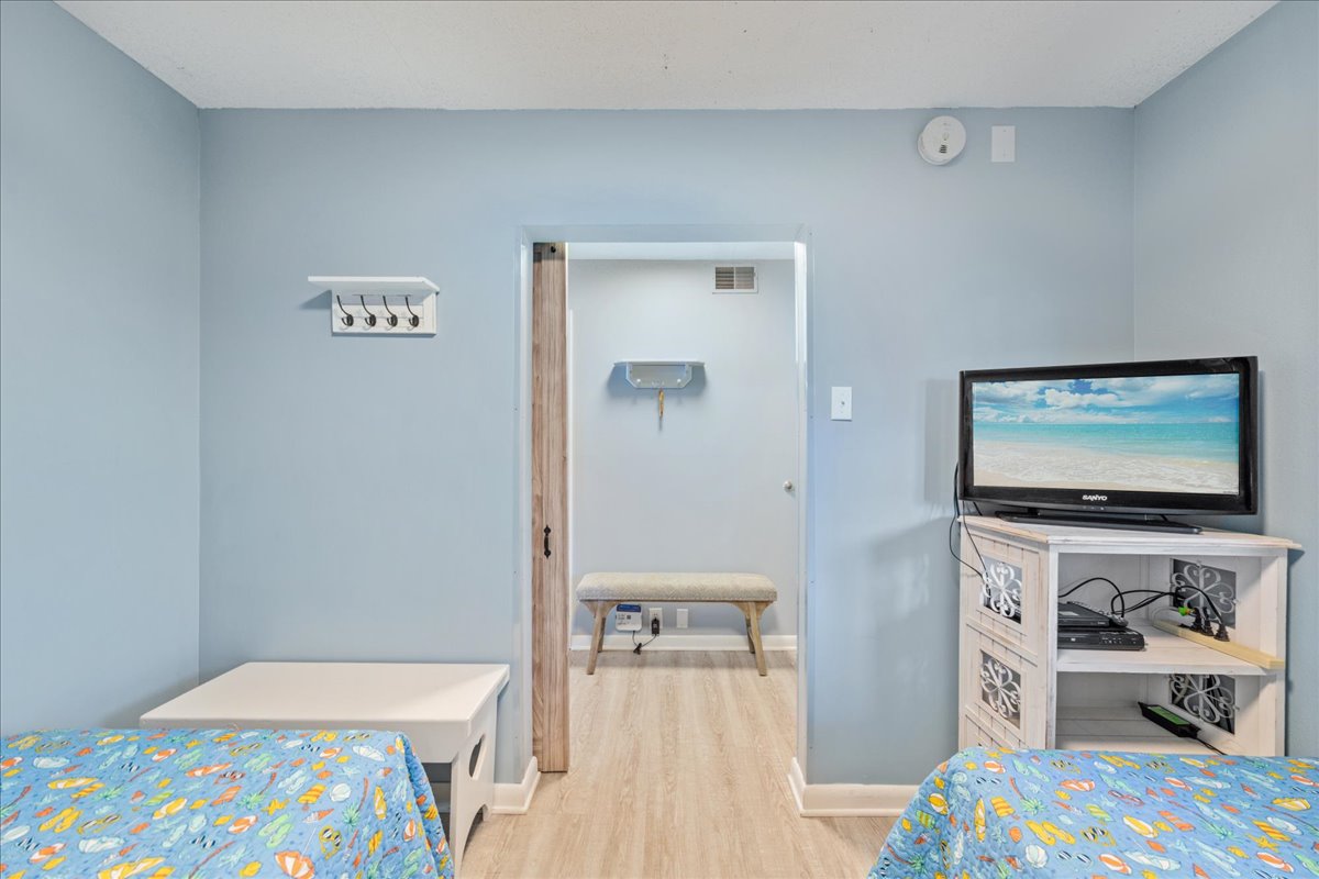 Offering 2 Cozy Twin Beds and a Flat Screen TV.