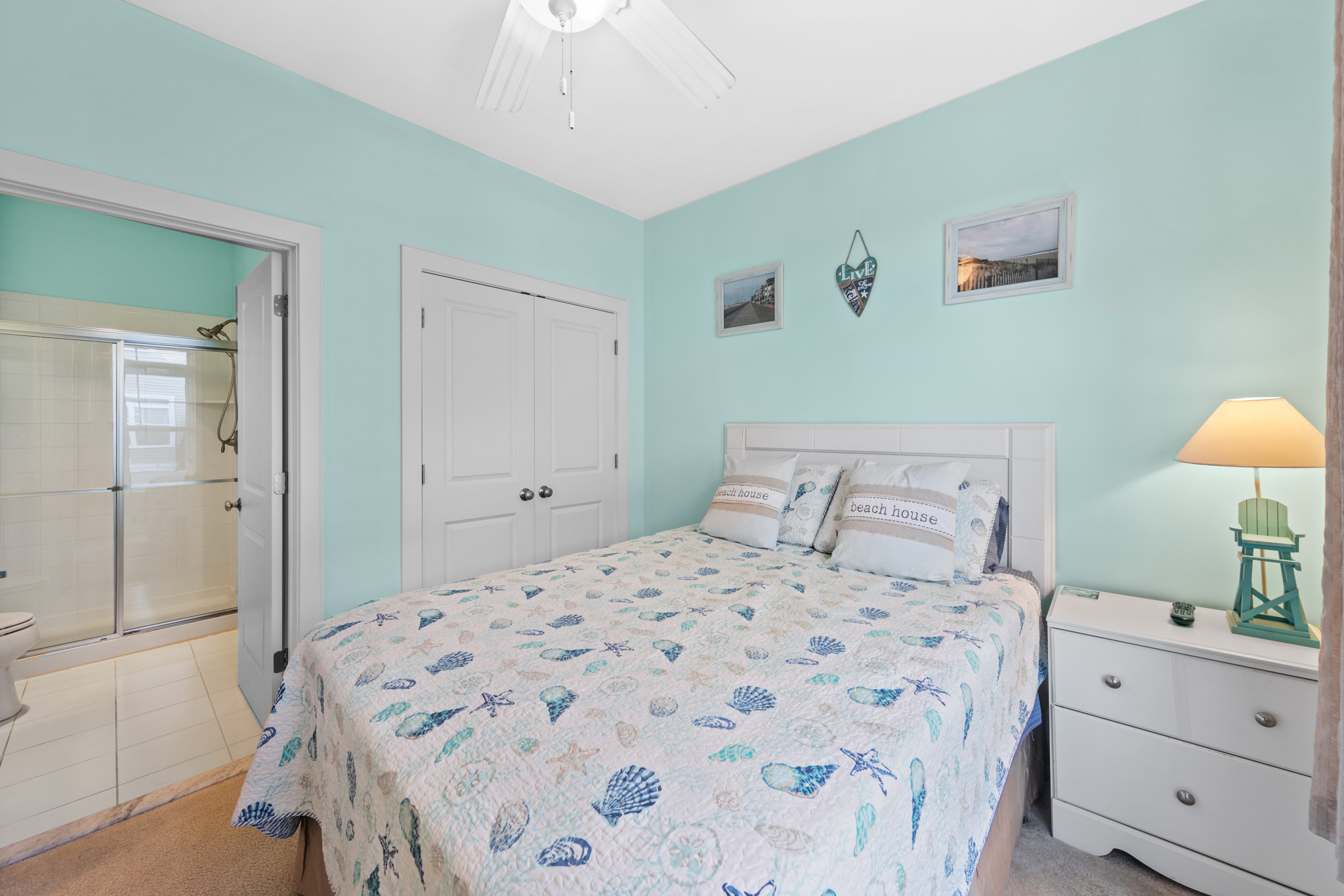 Bedroom 4 is a bright and coastal retreat.