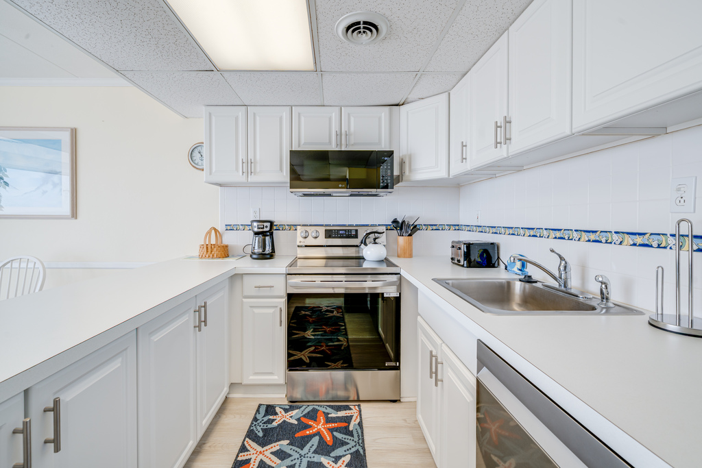 Bright, White & Beachy - this Kitchen is sure to WOW!