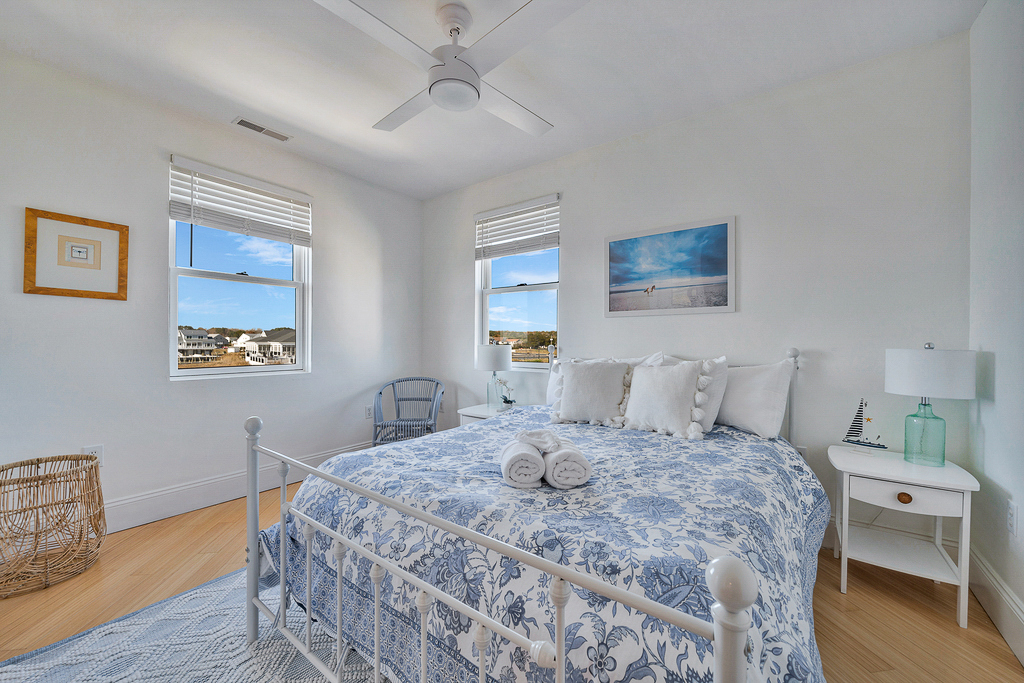 Bedroom 2 has a comfy Queen Bed and more Water Views.