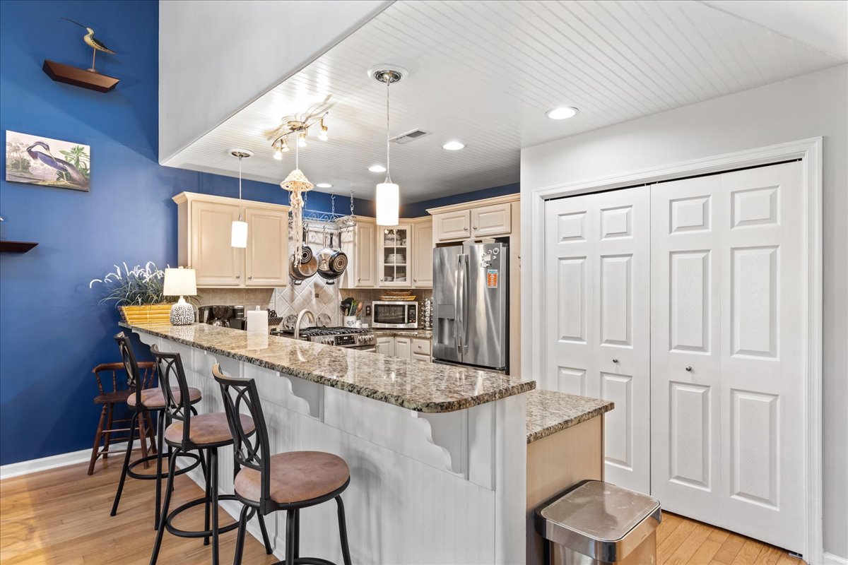 Chef's Kitchen with Granite Countertops and Stainless Appliances.