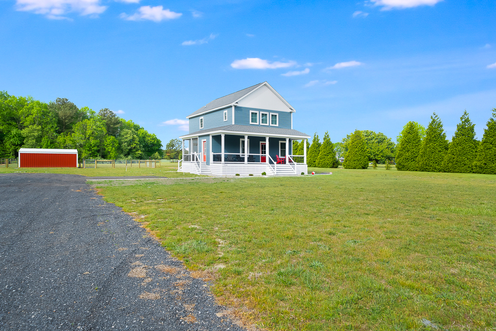 This fabulous BRAND NEW Home is located just off Chincoteague Island in Watts Bay.