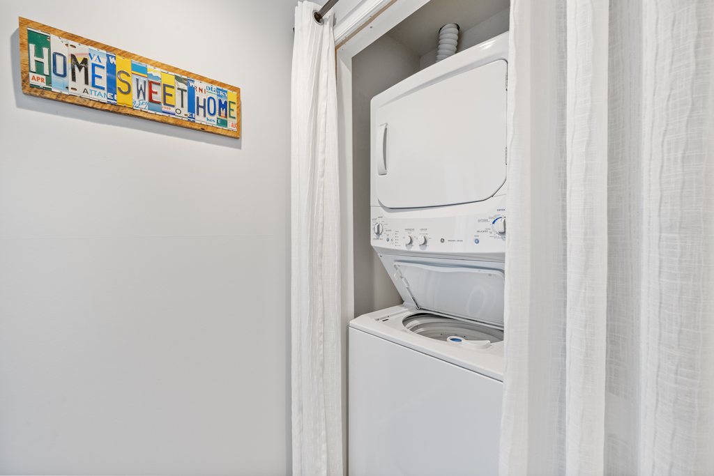 Just outside of Bedroom 1 is a Stackable Washer and Dryer for your convenience.