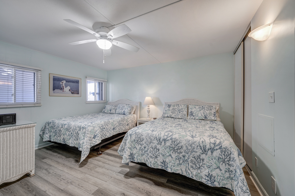 The Bedroom features 2 cozy Queen Beds!