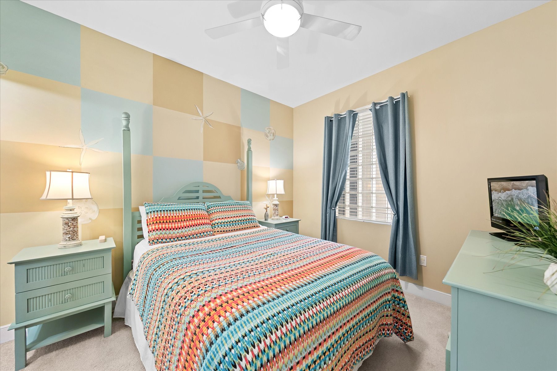 Bedroom 2 offers a Queen Bed.