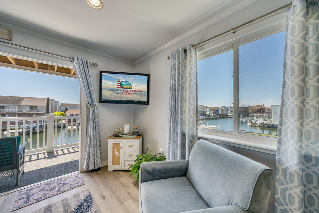 Relax in the AC & enjoy the Flat Screen Smart TV & Gorgeous Bay Views right from your couch!