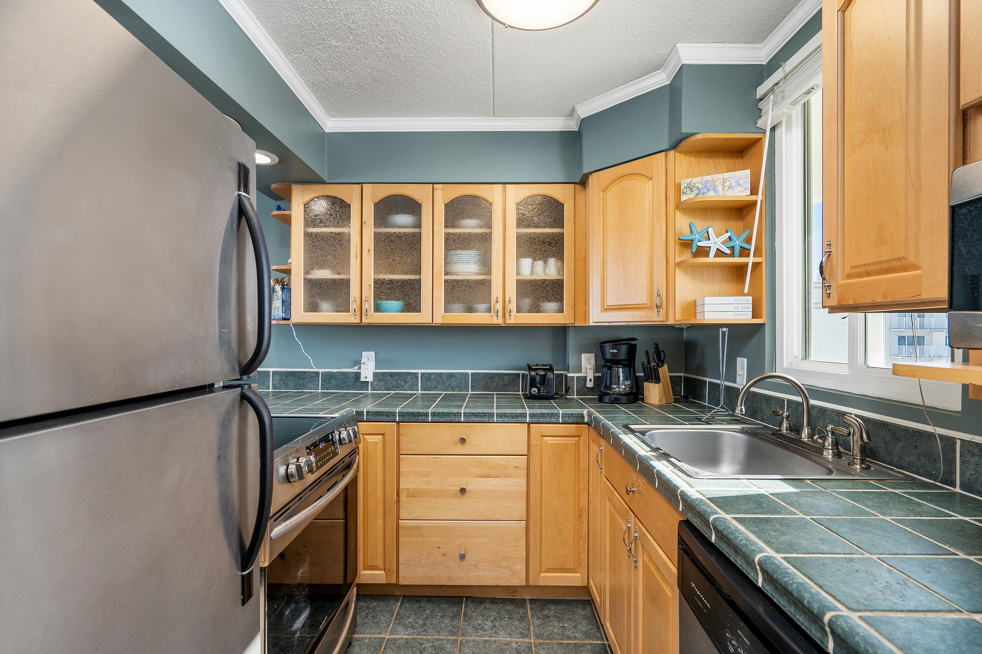 The Chef in your Family will fall in love with the Contemporary Kitchen & Custom Countertops.