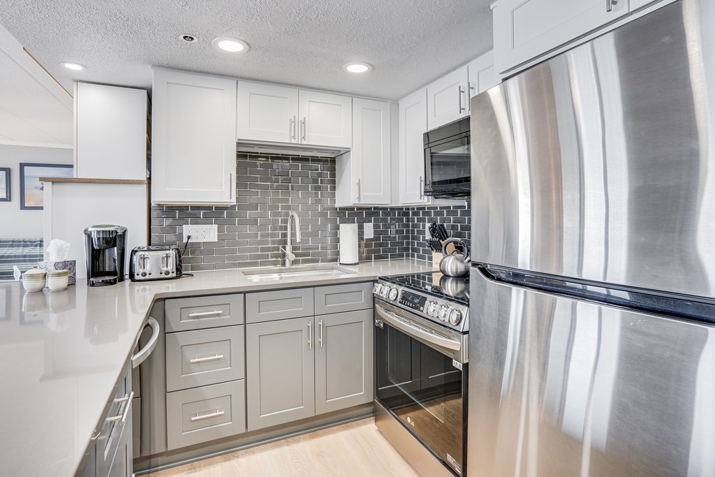 This newly renovated Kitchen is fully stocked with all the essentials!
