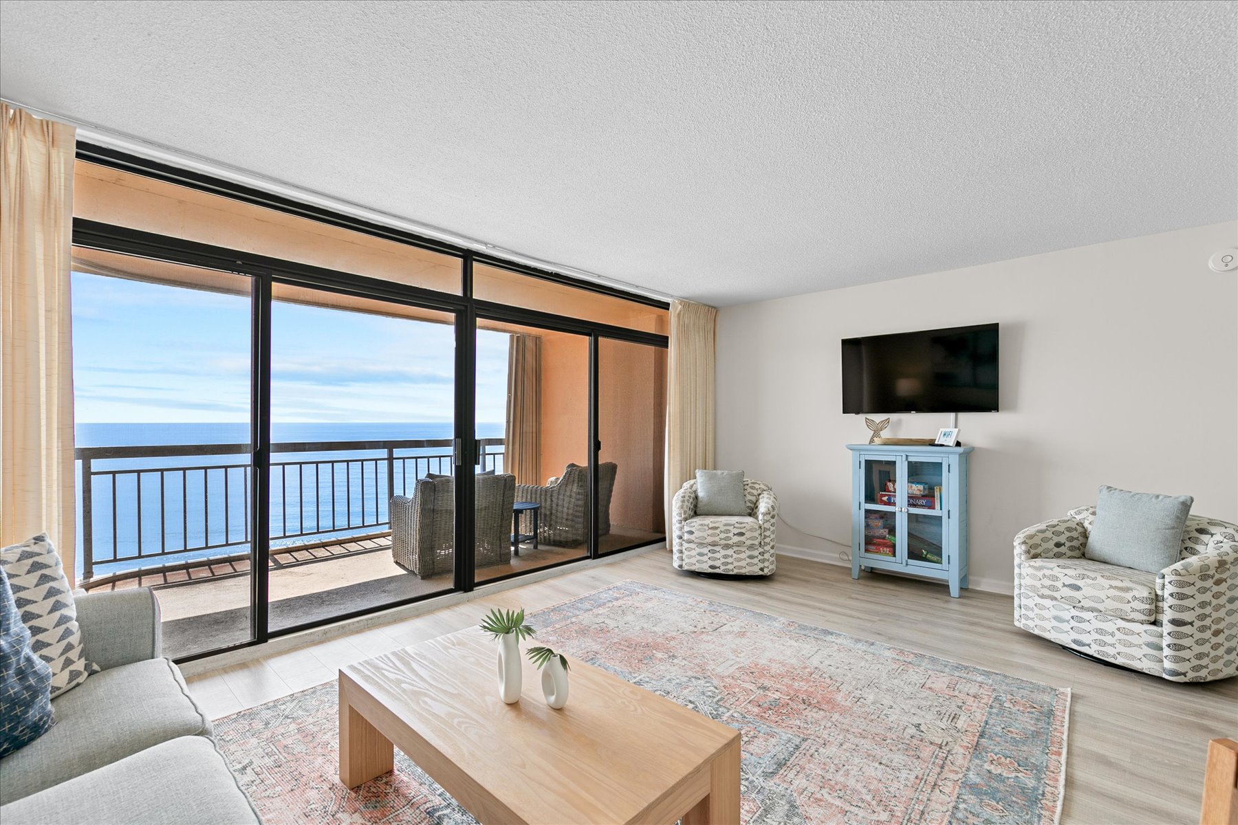 This Spacious and Modern Living Area is sure to be a crowd pleaser!