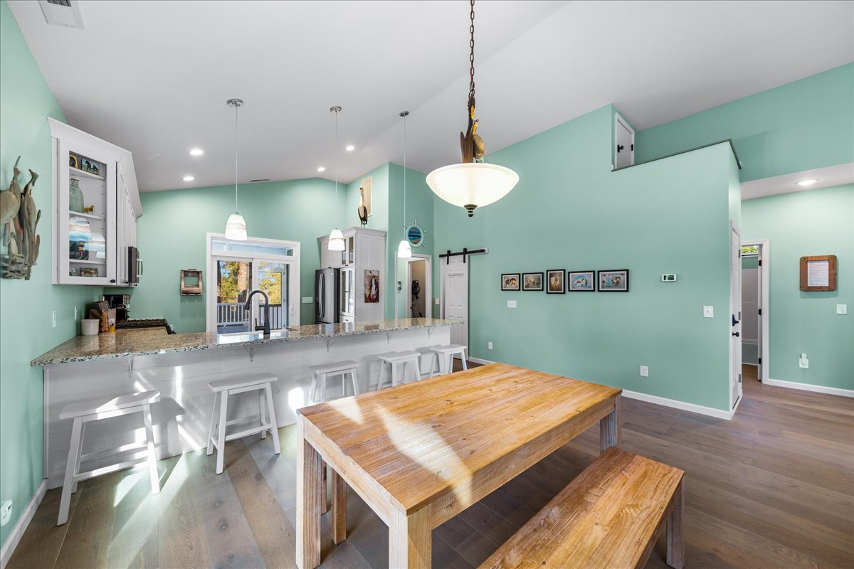 Dine in the comfort of Central AC, or Al-Fresco on the Screened Porch.