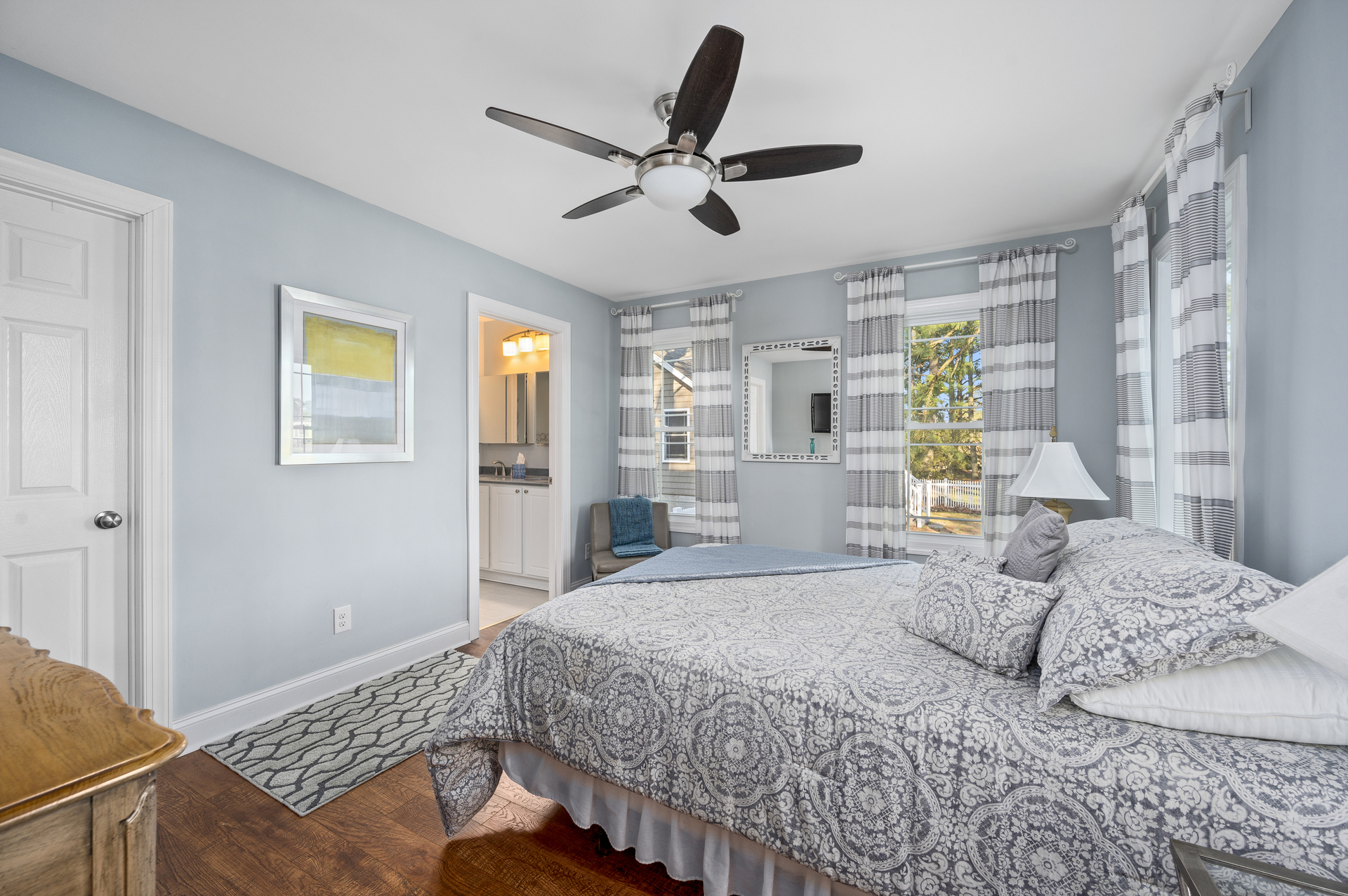 Serene grays and crisp whites are welcoming.