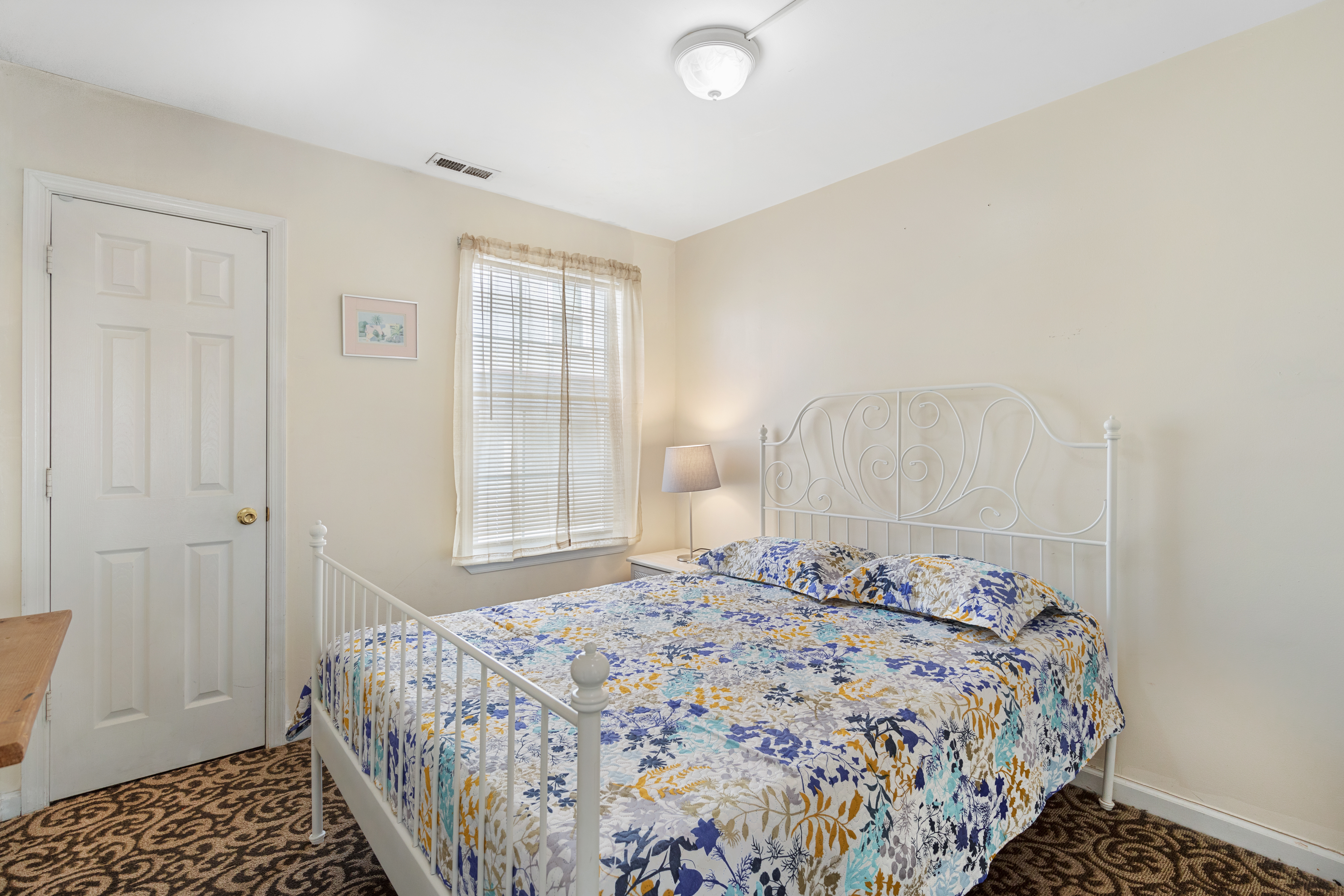 Bedroom 2 offers a queen size bed.