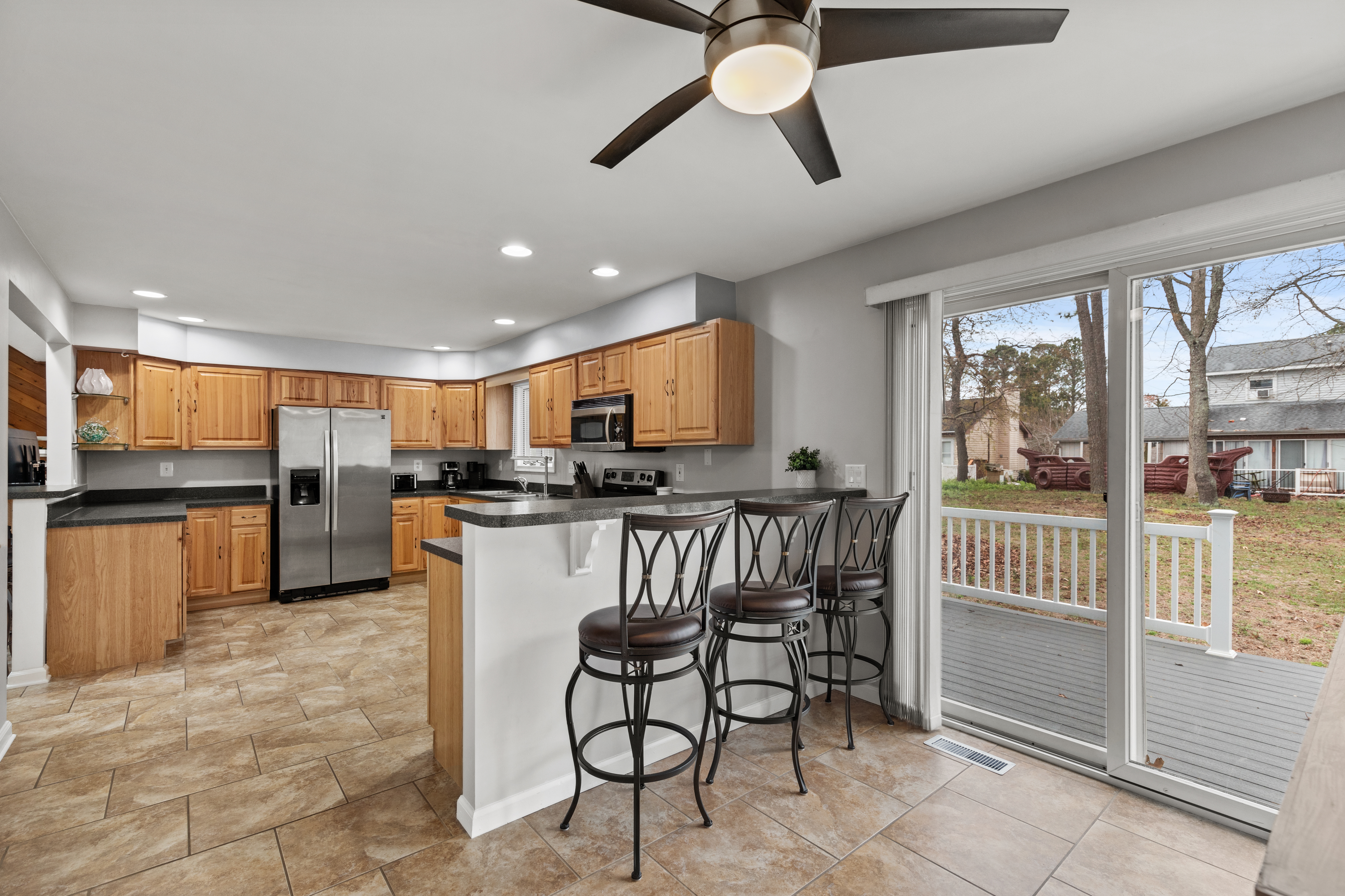 Breakfast Bar seating on both sides as you enter the Kitchen!