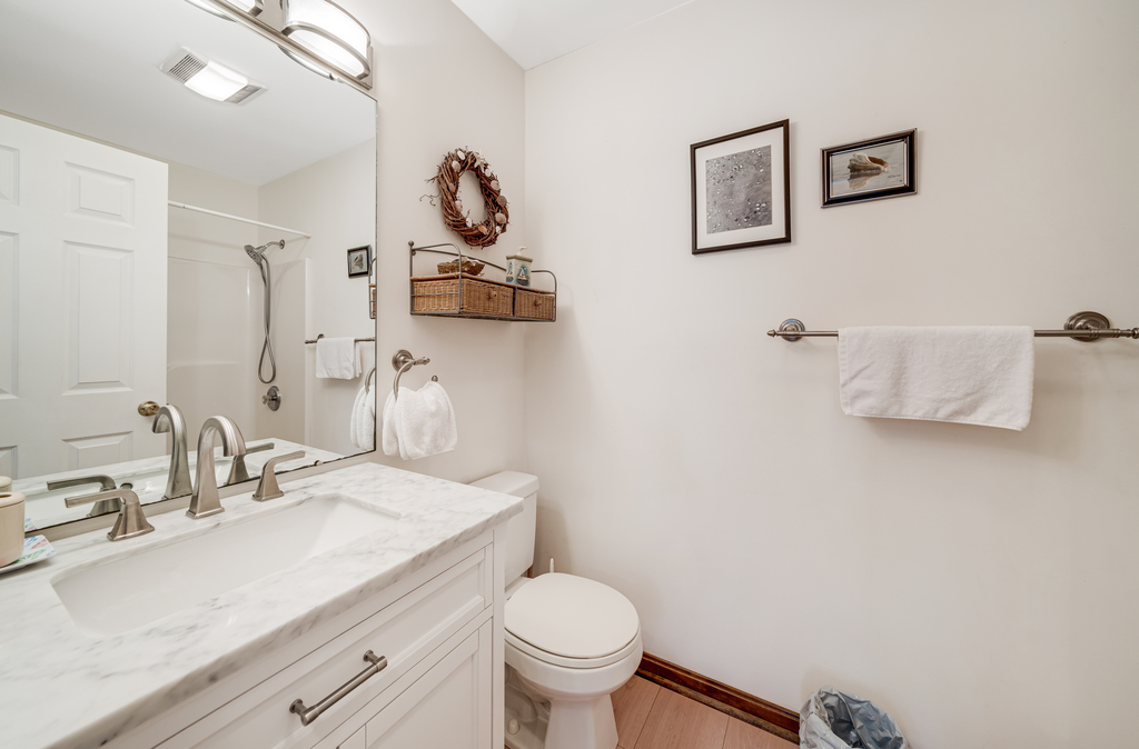 Full Bath 1 is just across from Bedroom 1.