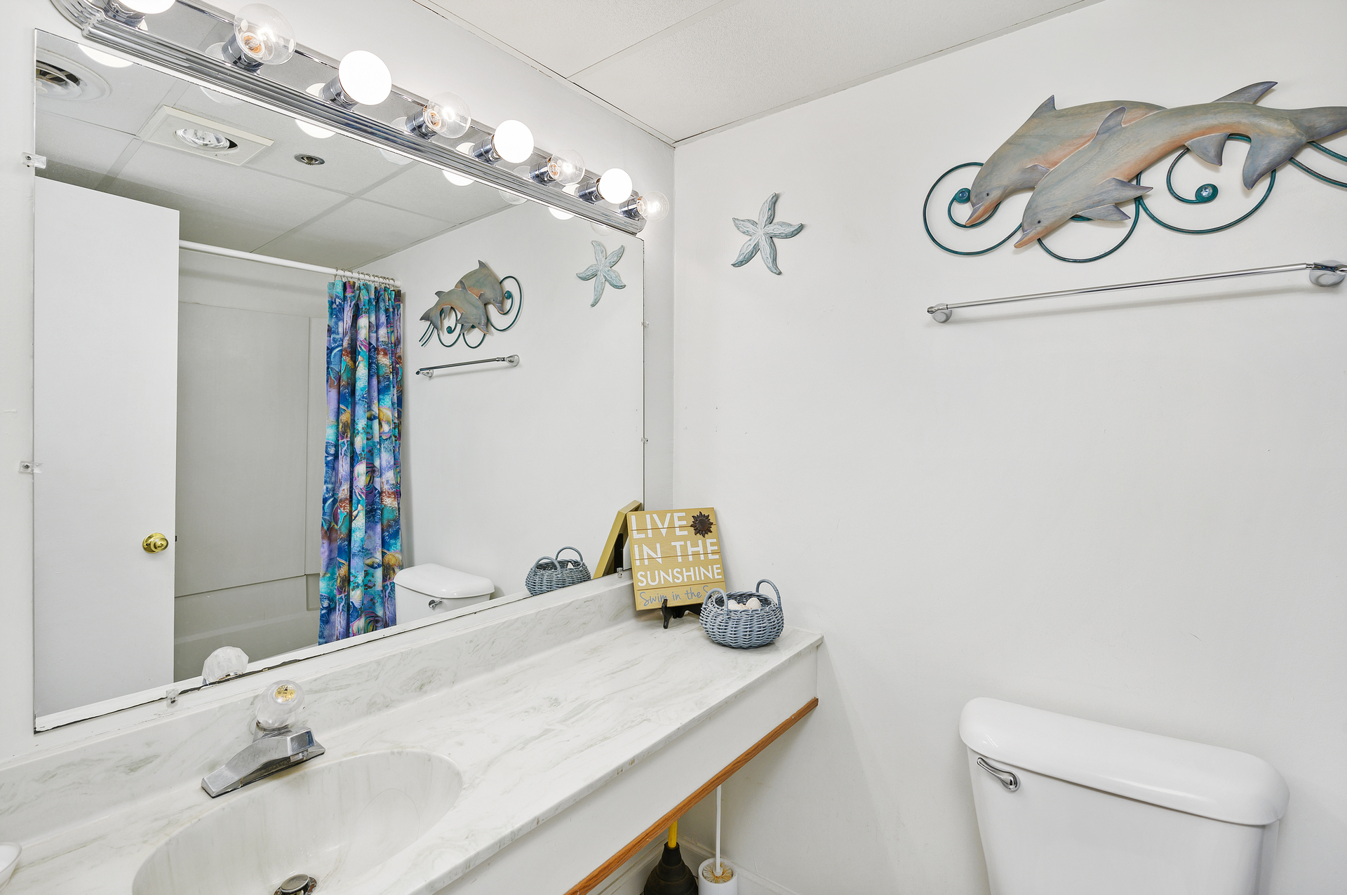 Extended counter space is an added bonus to this Second Bath,