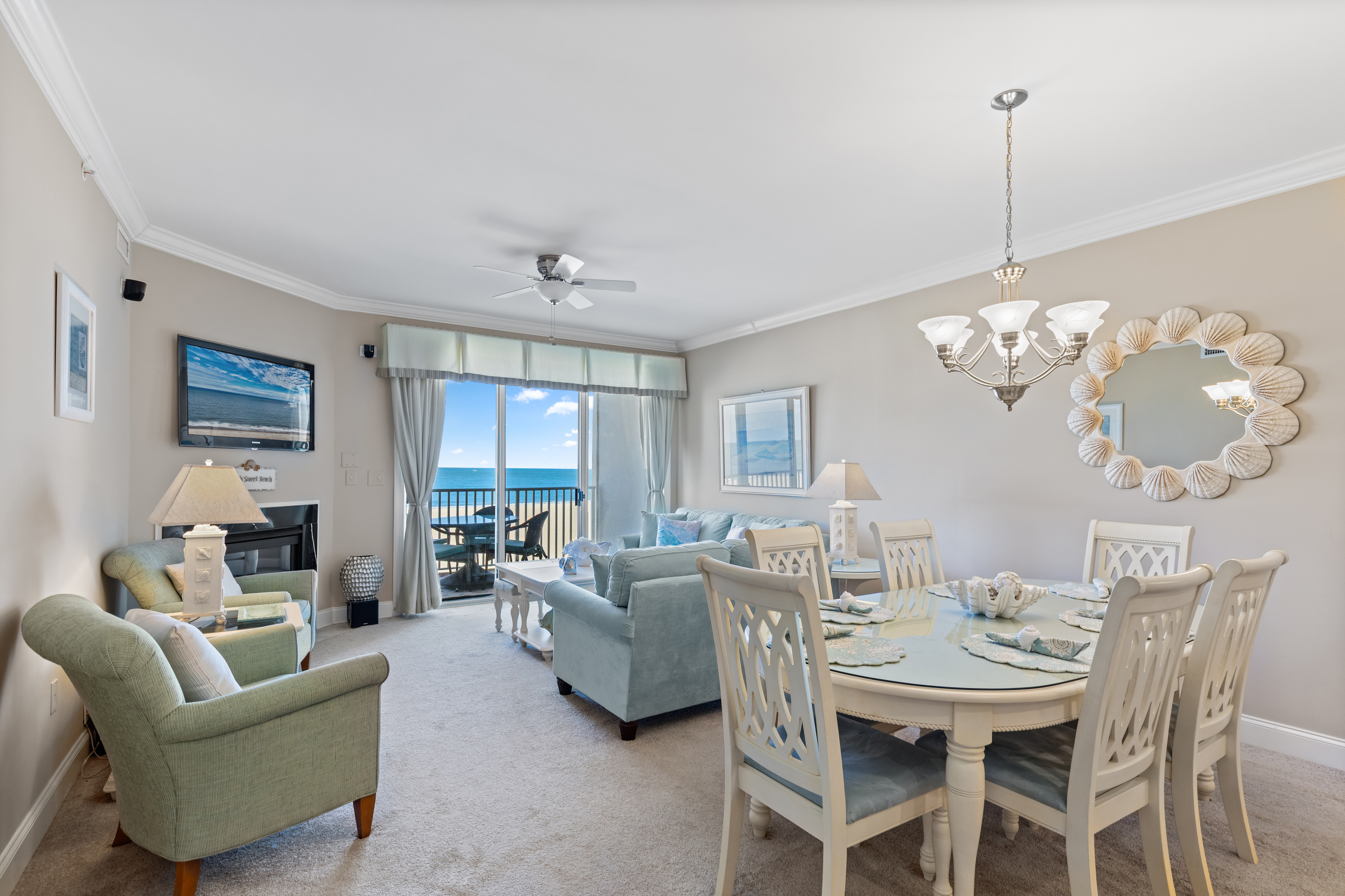 This warm, open Living Space has a large Gourmet Kitchen, Dining Area, and Living Room that flow together.