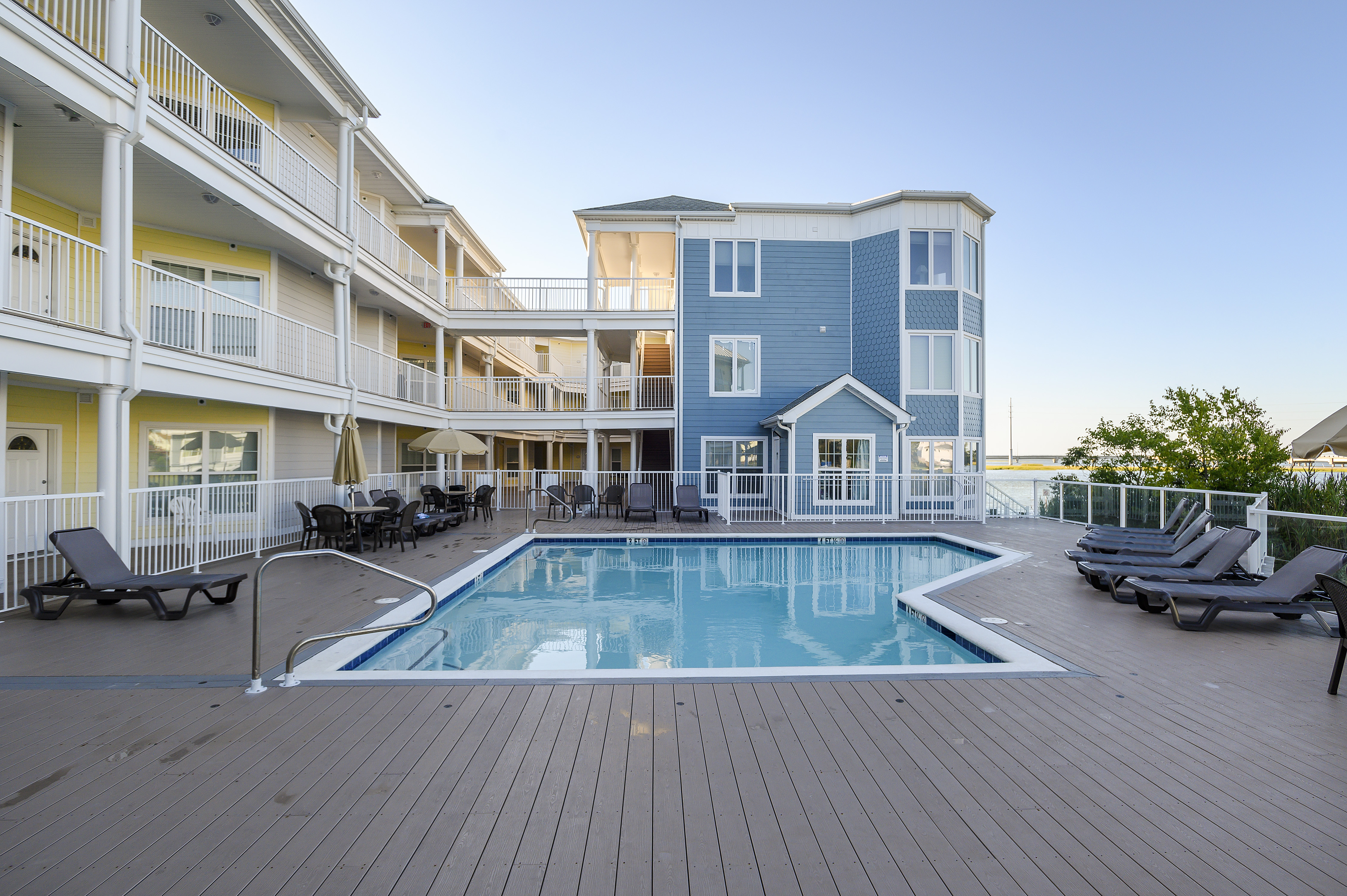 Refreshing Outdoor Pool is literally only steps from Sunset Bay 116!
