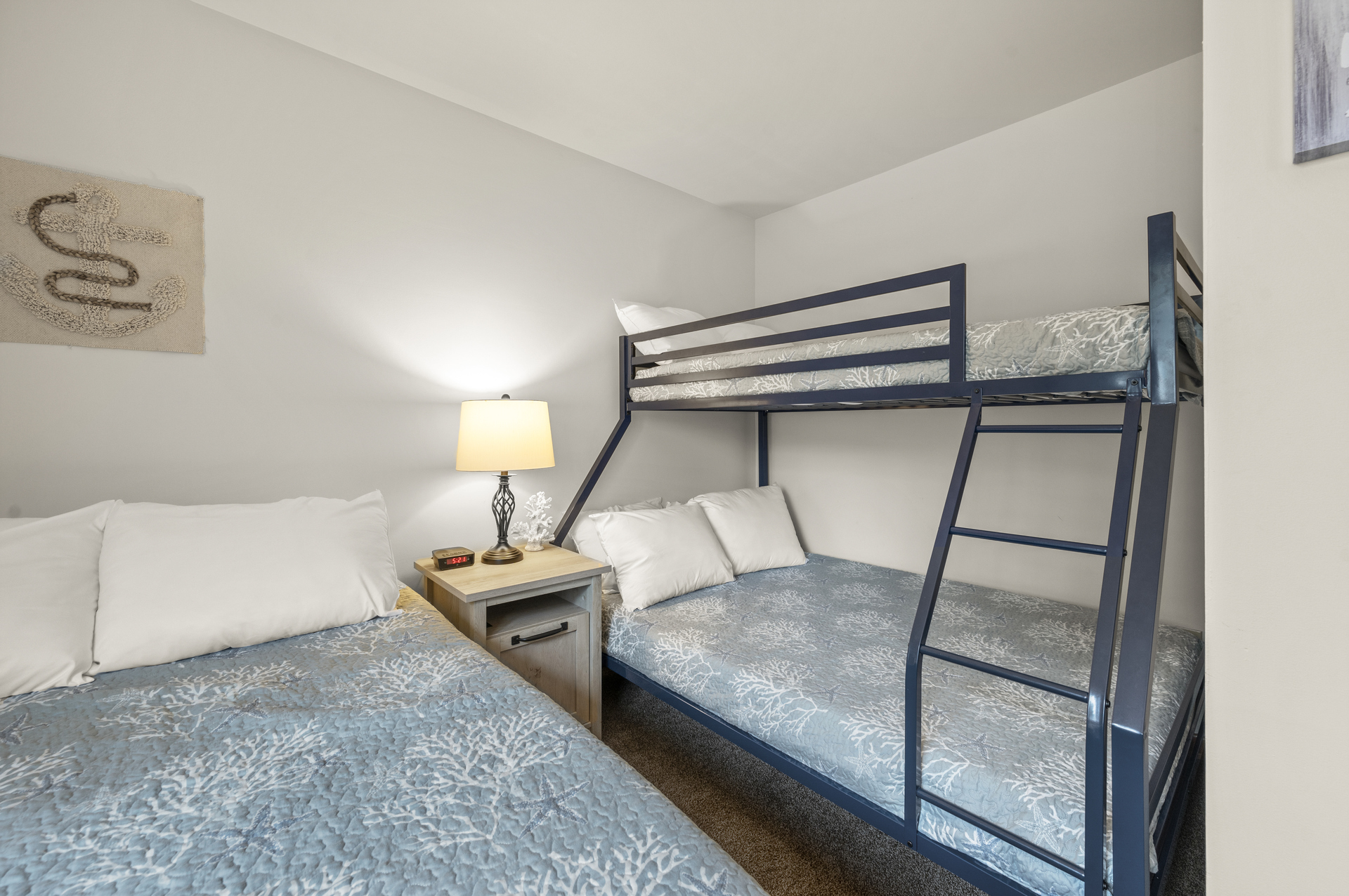 Bedroom 2 sleeps 5 with a Pyramid Bunk (Twin over Full) and another Full Bed.