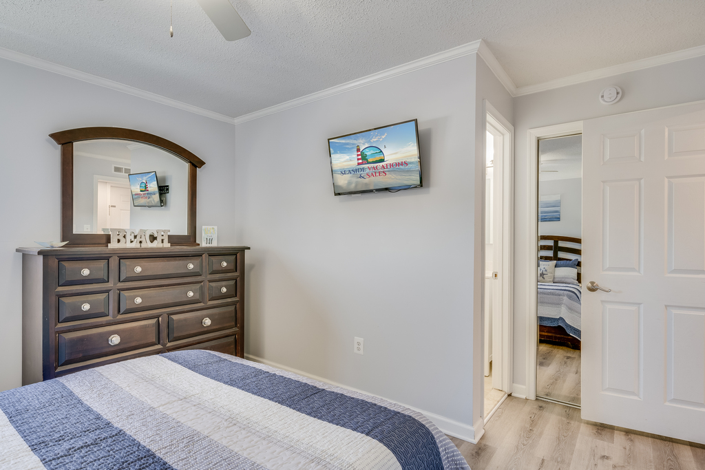 Sink into the Cozy Queen Bed and enjoy the Flat Screen Smart TV.