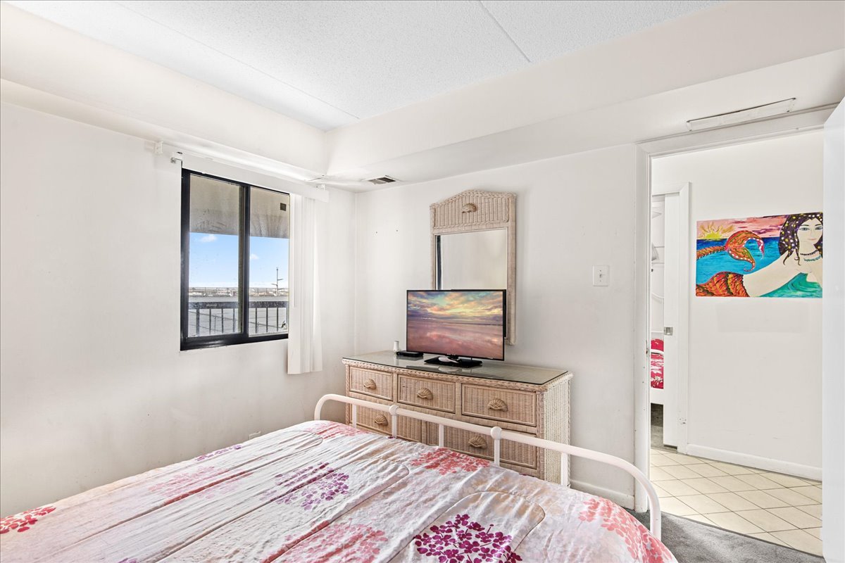 This Bedroom offers a Cozy Queen Bed and Flat Screen TV!