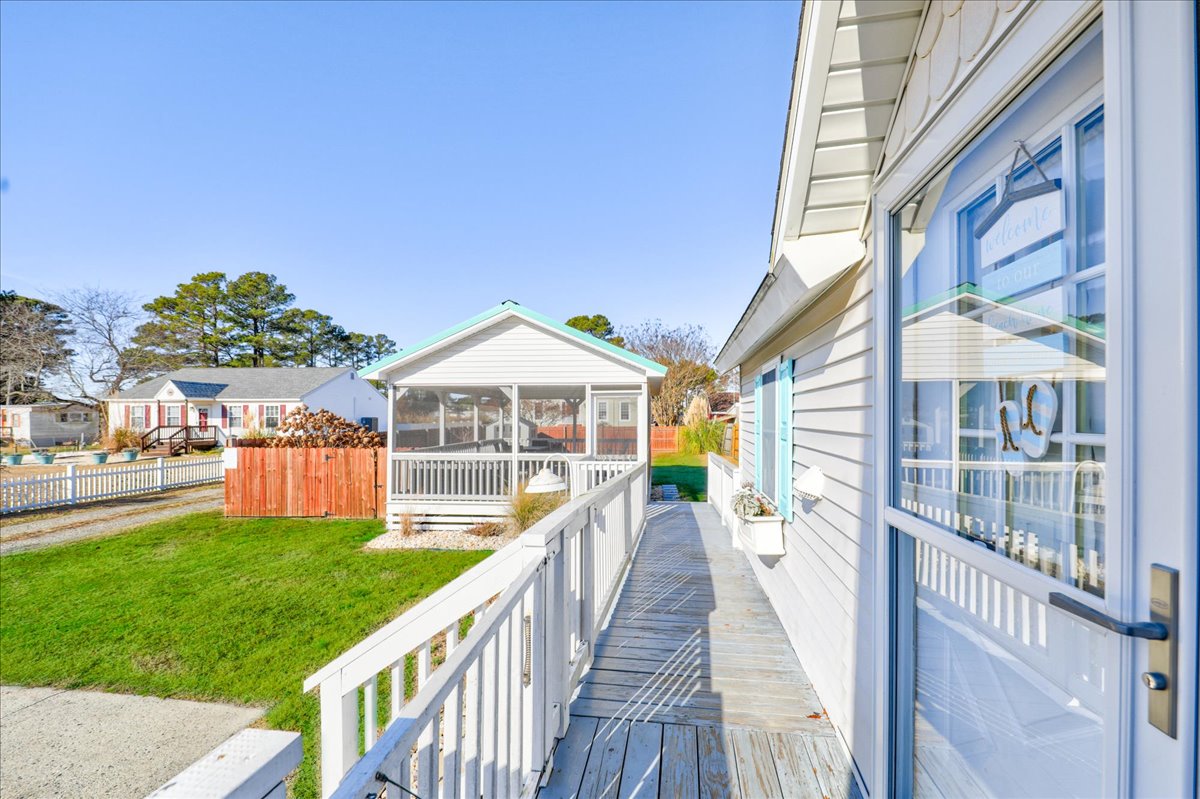 Slip outside to the Detached Screened Porch.....