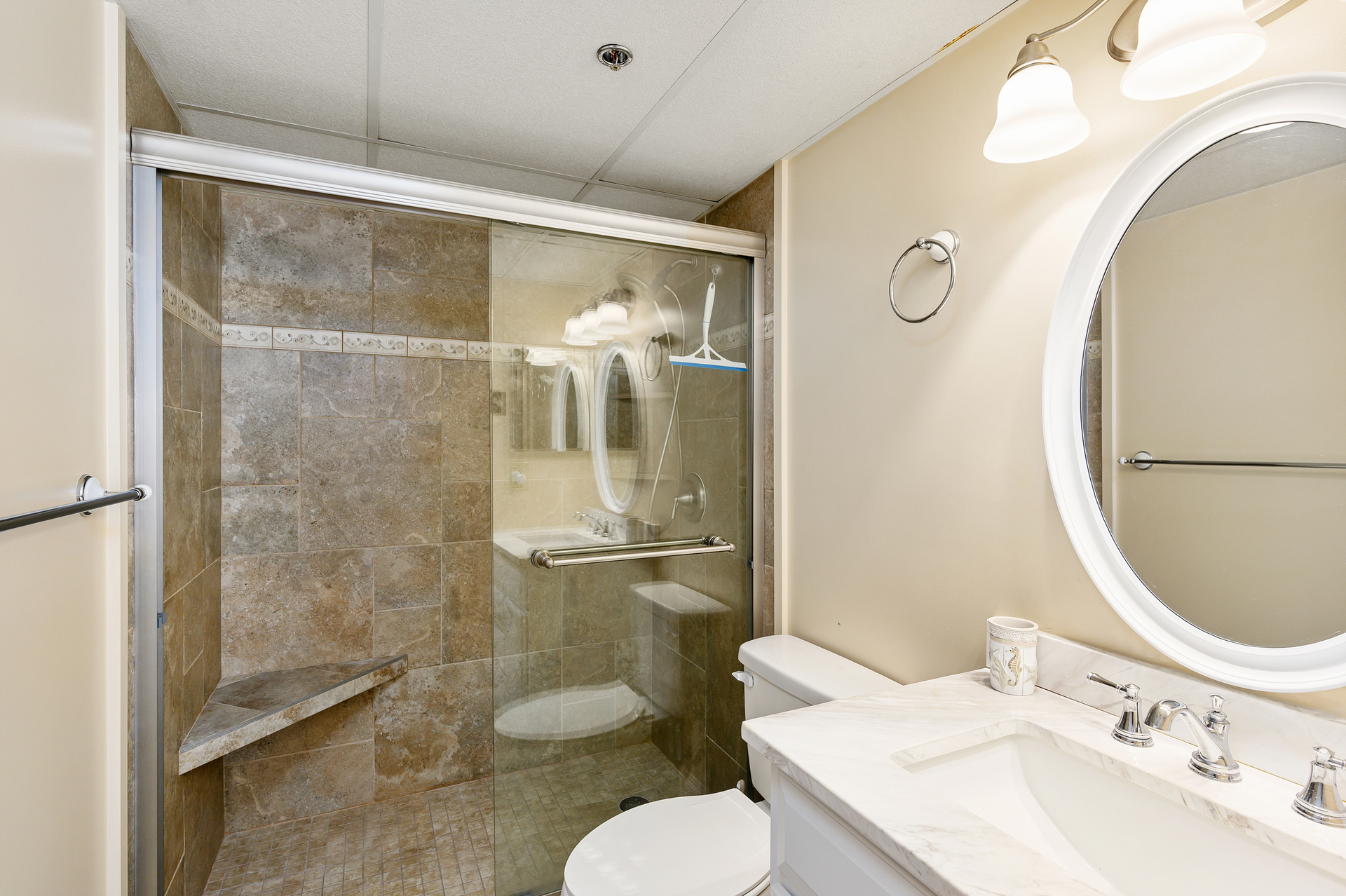 Wash the sand off in this beautiful walk in shower