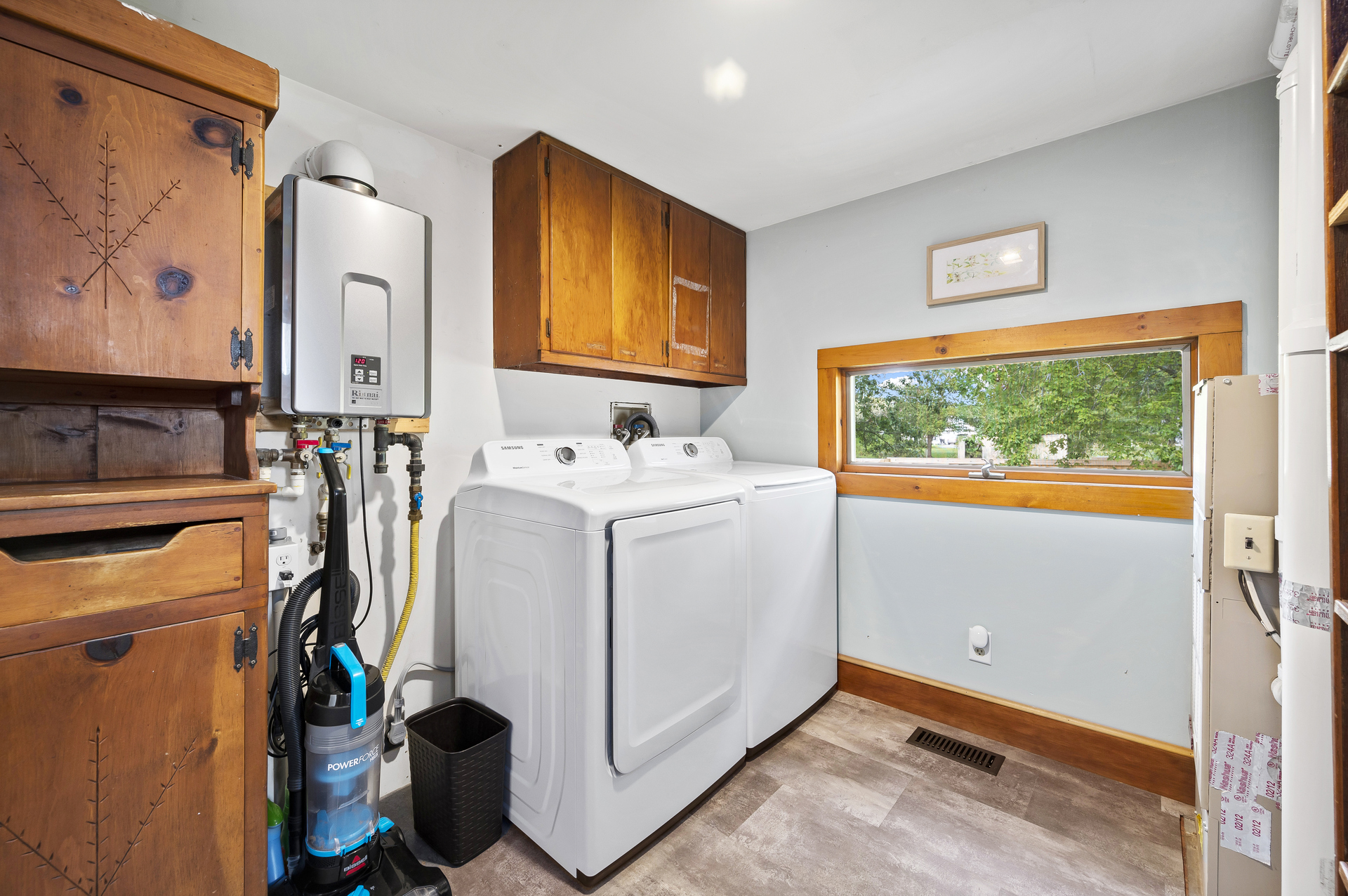 Just off Kitchen is convenient Laundry Area.