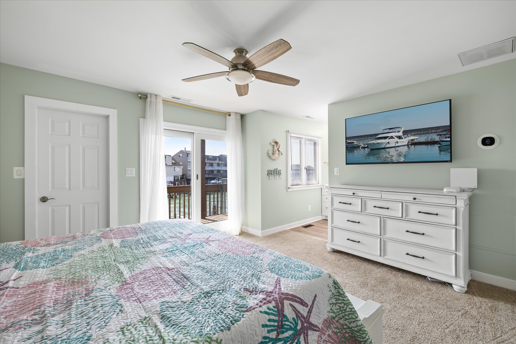 Abundance of Natural Light beams through the Sliding Doors.