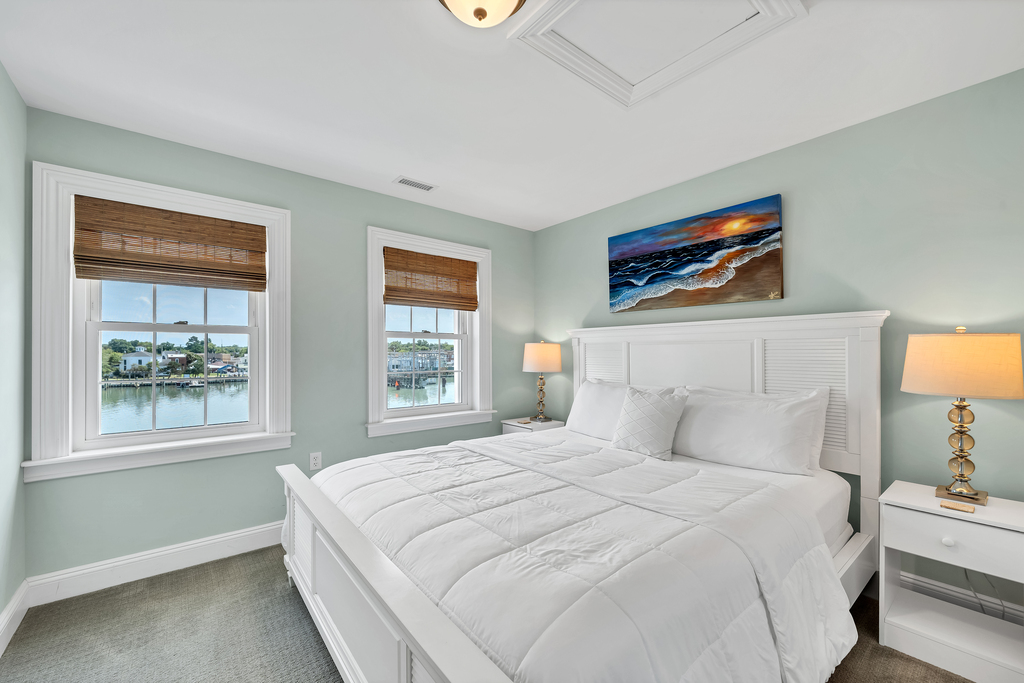 Bedroom 2 has a comfy King Bed and Water Views.